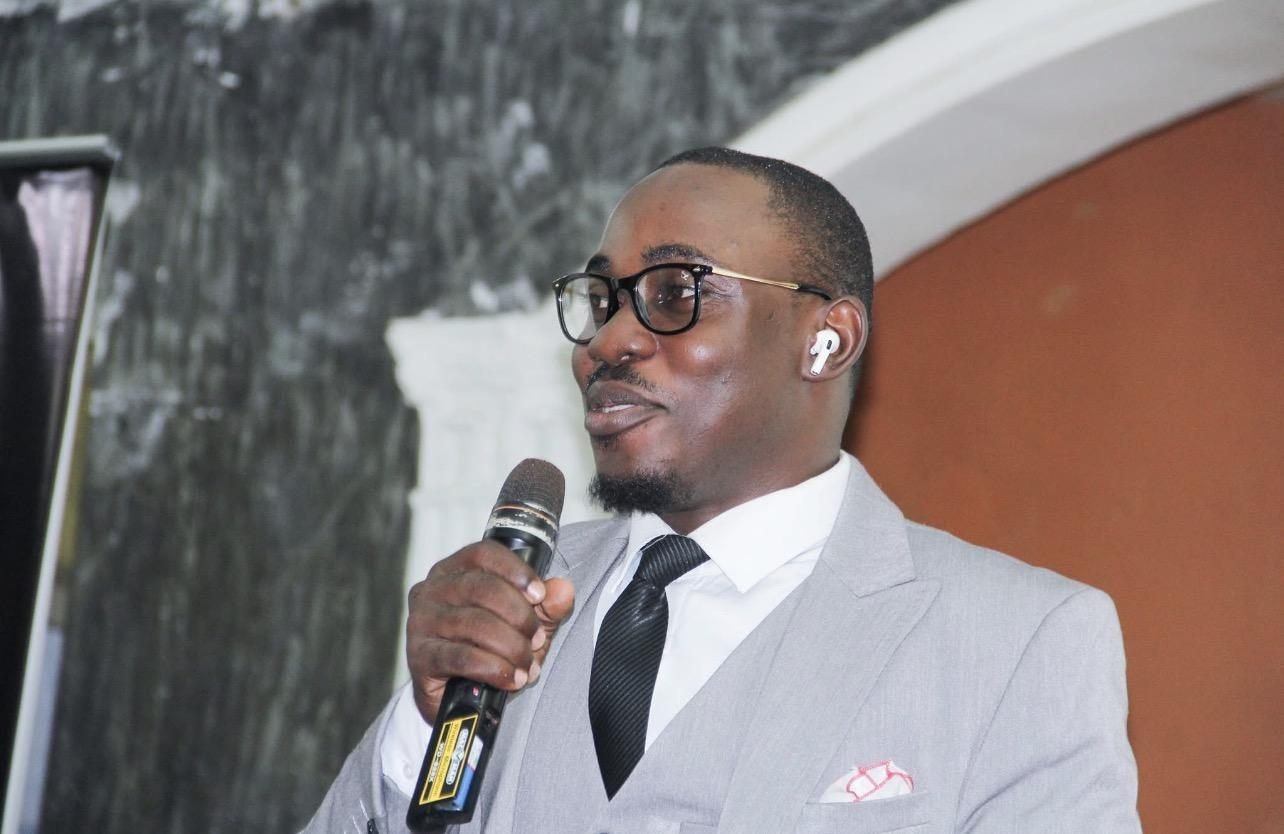 Ayukegba Mohamed Kalvin Clein speaking at an event