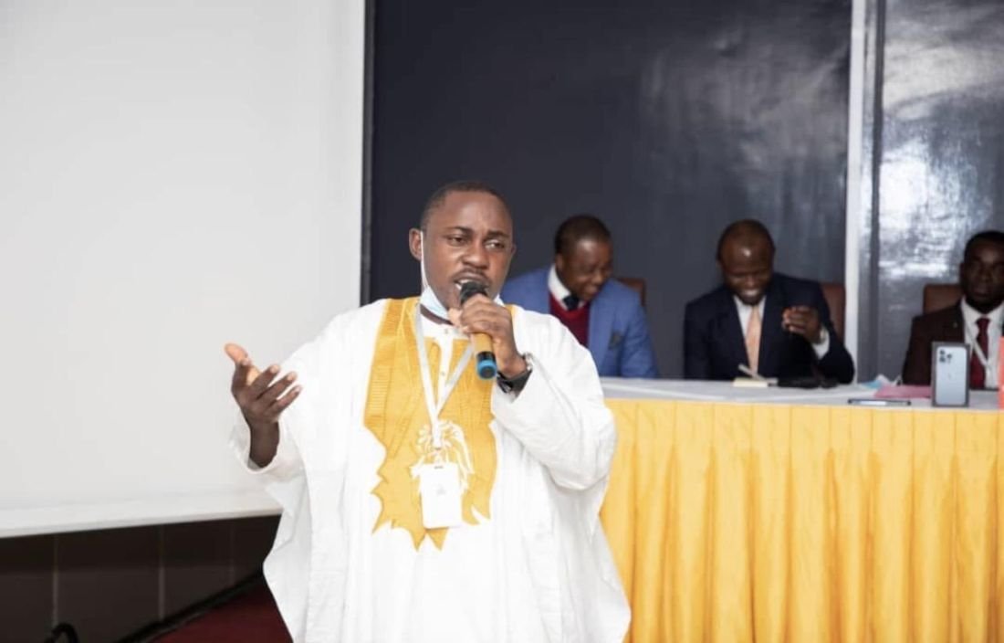 Ayukegba Mohamed Kalvin Clein speaking on a conference panel